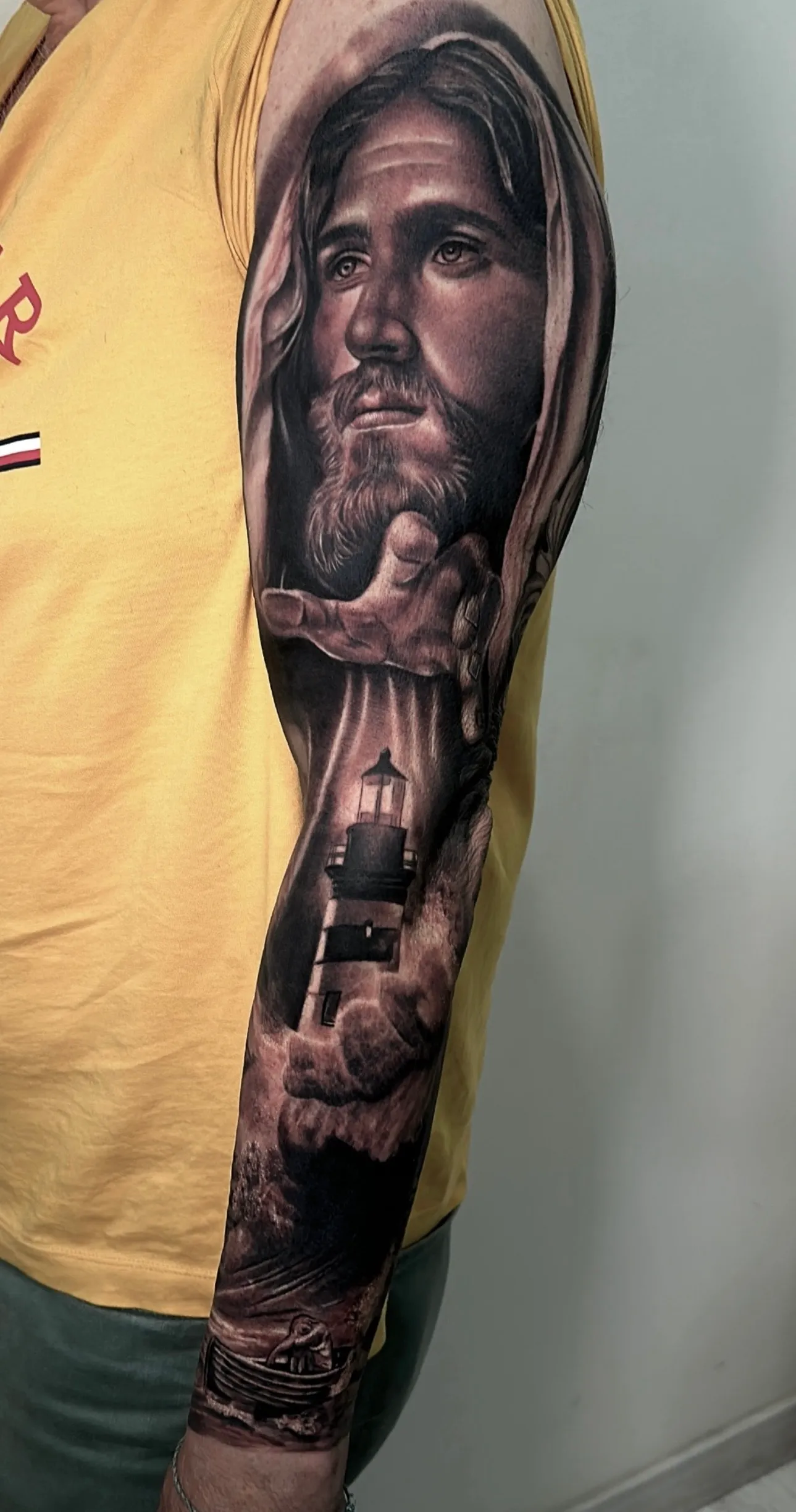 Manga completa realismo con Cristo religioso, faro y barca de pescador madrid