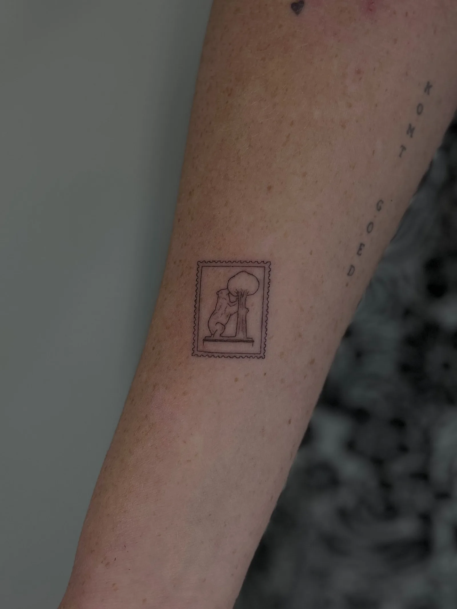 Souvenir mini tattoo of Madrid skyline in fine line on ankle