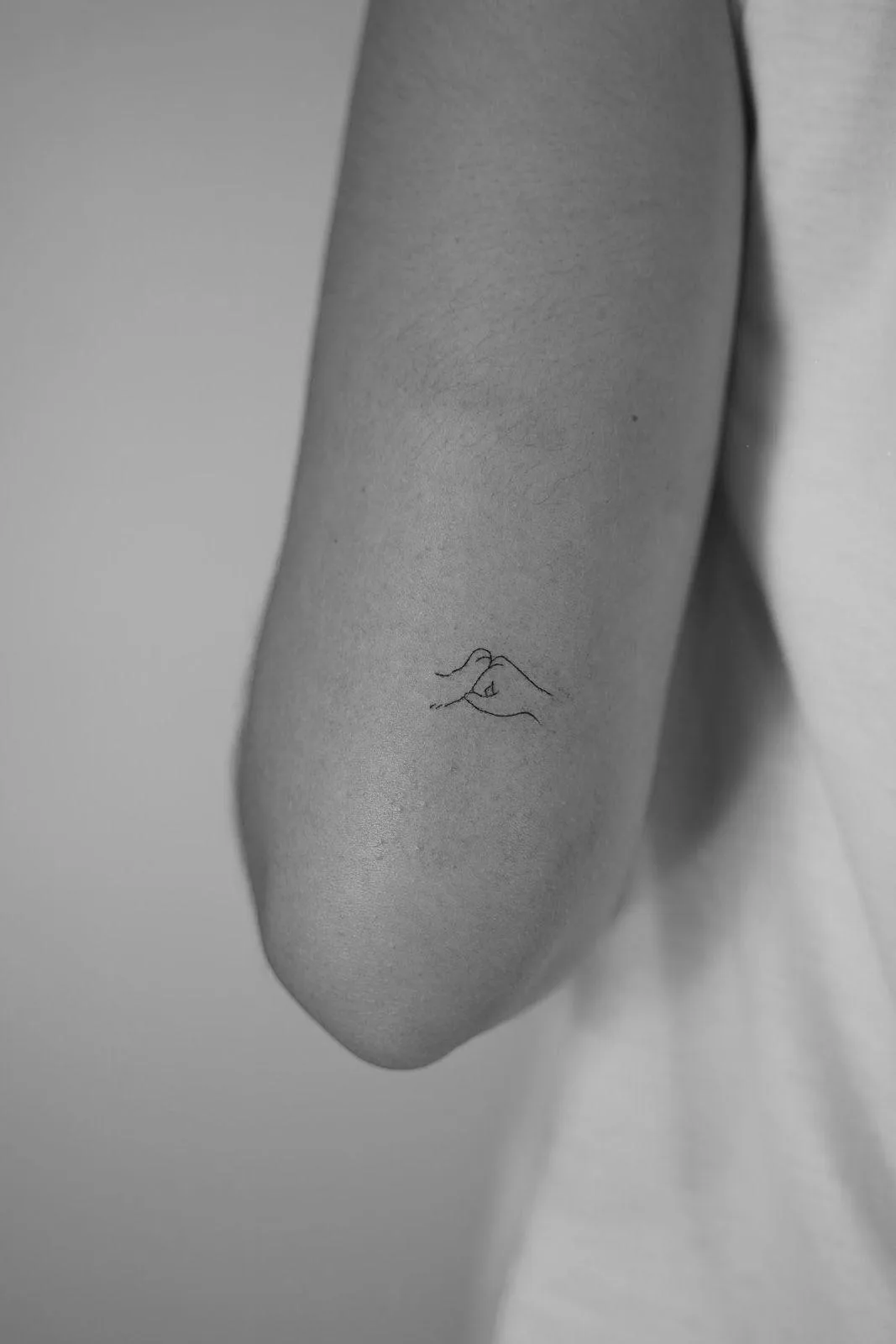 Minimalist small dog silhouette in fine line black ink