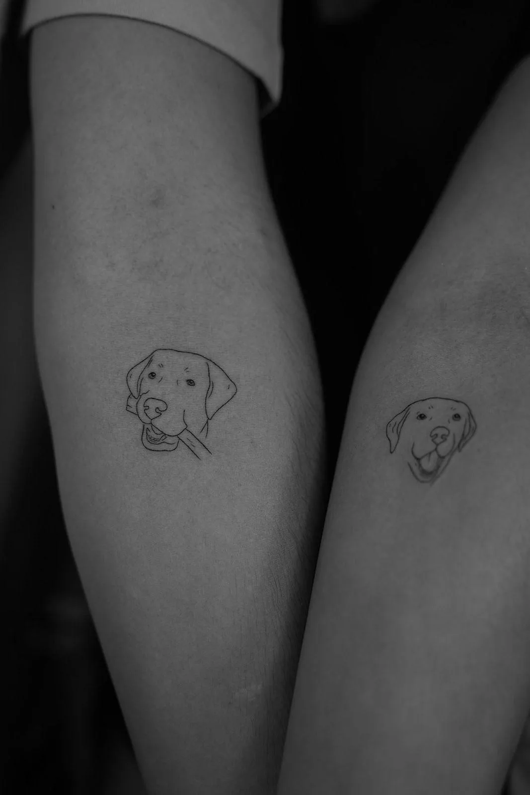 Pet memorial tattoo with name in delicate handwritten script