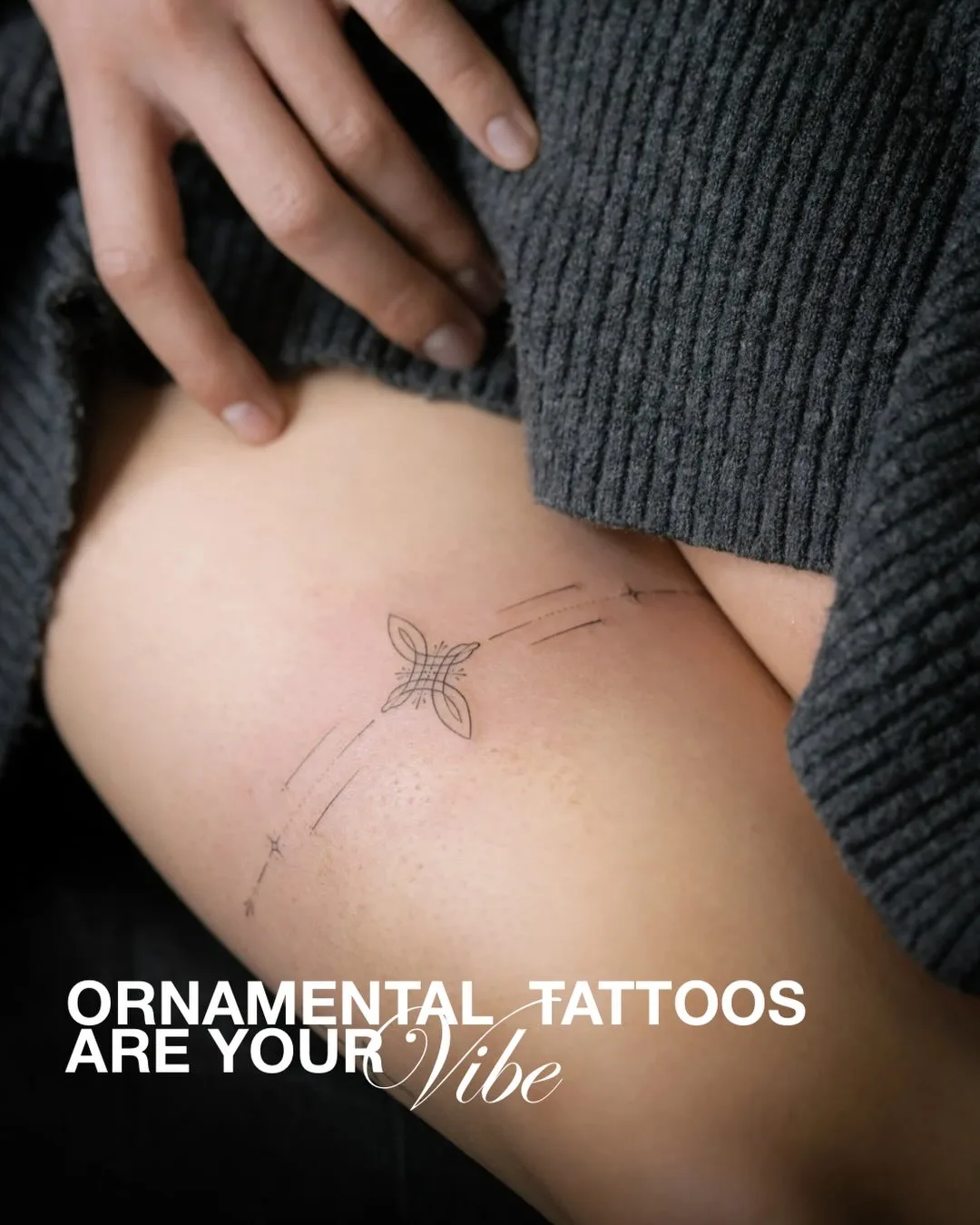 Ornamental tattoo on the back of the hand with symmetric fine patterns